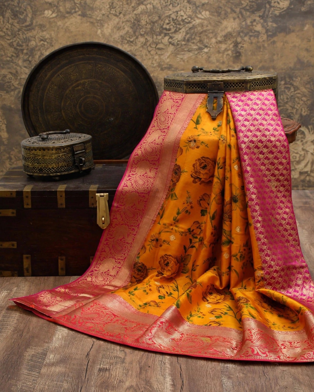 Yellow red silk saree with floral pattern and gold zari