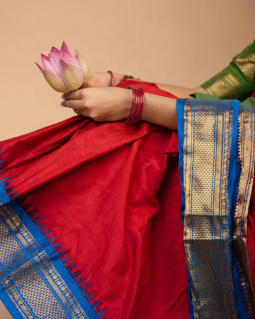 Ilkal Silk Saree with Vibrant red and Blue Border with temple patterns